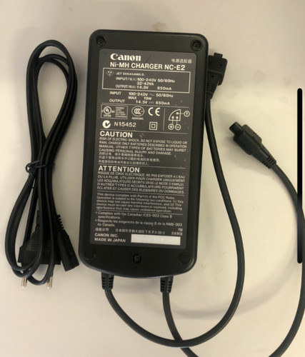 Caricabatteria canon per - nc-e2,