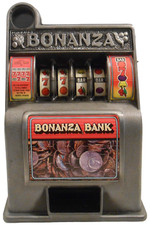 BONANZA BANK JAPAN MID-20TH C VINTAGE MTL/PLSTC SLOT MACHINE, CON 3 QUADRANTI, LEVA DI TRAZIONE