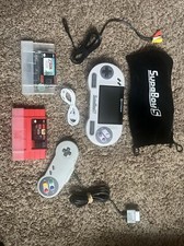 SupaBoy S SNES portatile con controller e 2 carrelli SNES ROM