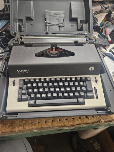Olympia report luxe - report, de