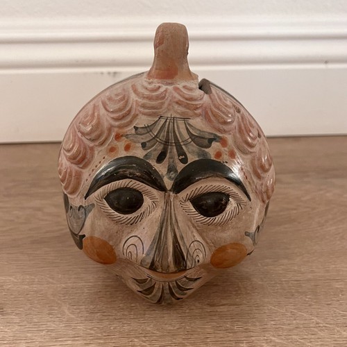 Salvadanaio moneta faccia