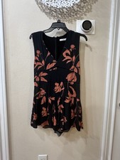 Pagliaccetto floreale nero e