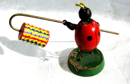 Coccinella vintage che tiene