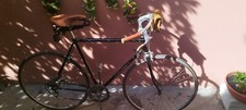 bicicletta vintage acciaio nero sellino ammortizzato e manopole in pelle