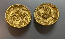 2 grandi bottoni dorati -