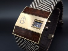 [ULTRA RARO] Custodia Nixon ROTOLOG: marrone/ottone bicolore con fascia a spina di pesce