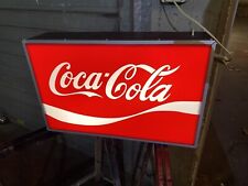 insegna luminosa Coca Cola