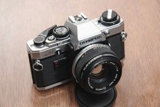 Olympus OM-10 con 50 mm 1:1.8