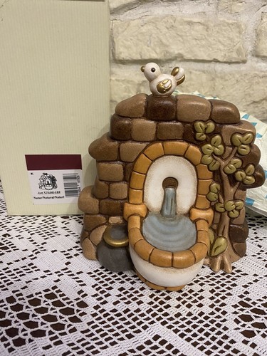 Thun fontana con uccellino - fontana,