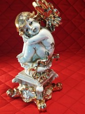 Putto In Legno Decorato