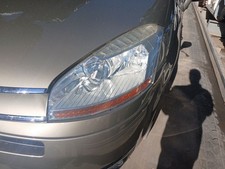 FRONT LEFT HEADLIGHT / 1077577