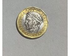 moneta color oro e argento