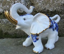 PORCELLANA ELEFANTE DIMENSIONE:17X14X9 CM.