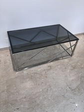 Tavolo basso acciaio e