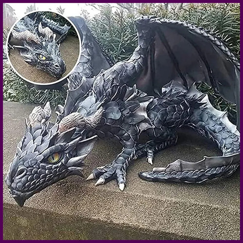 Scultura drago accovacciato