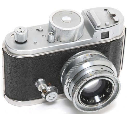 Macchina fotografica robot - @,