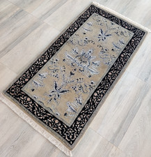 Tappeto in lana annodato a