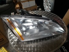 Fanale anteriore destro HELLA  1EL010201021 per Ford FOCUS II 2a serie nuovo