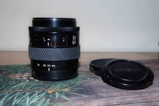 Minolta AF 24-50 mm f4, testato, tappi, paraluce.