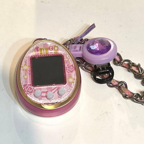 Tamagotchi rosa viola con - 4u,