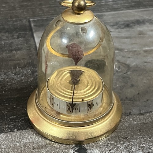 Antico uccellino bimetallico