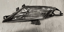 46469877 Proiettore SX LANCIA