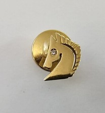 SPILLA DA GIACCA IN ORO GIALLO 18 Kt  TESTA DI CAVALLO CON BRILLANTINO