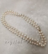 COLLANA PERLE BIANCHE 26" 22