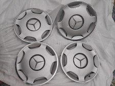 4 copricerchi R15 originali Mercedes Benz W124 borchie coppe 1244011424