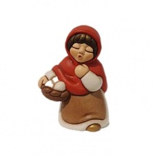 Donna con cesto di uova Thun