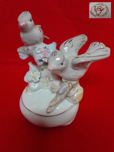 Figura porcellana pajaros - in,