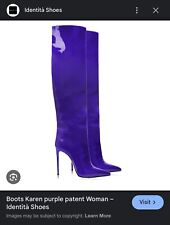 Stivali al ginocchio con tacco