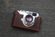 Custodia mezza fotocamera in