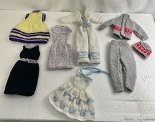 Hand knitted Barbie clothes