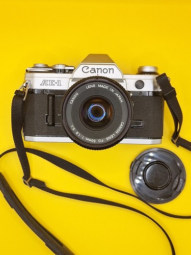 Canon obiettivo - +,