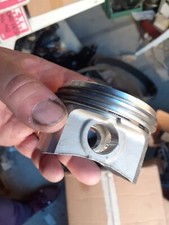 4 PISTONI COMPLETI DI FASCE FIAT PUNTO 2 1.2 BZ 7768966 MAGGIORATI 4/10 ORIGINAL