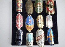 COLLEZIONE DI 12 DISTINTIVI PER LA BICICLETTA