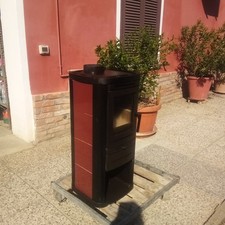 stufa a legna in ghisa usata