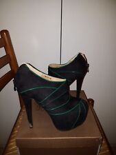 Tacchi alti 15cm circa neri con strisce verdi acceso numero 38 usati poche volte