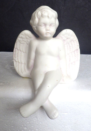 Statuina cherubino seduto - , in