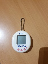 Cucciolo Virtuale. Mini Pets 8 in 1. Virtual pets. 1997