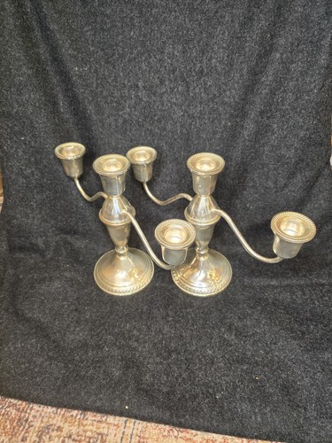 Coppia candelabri - di,