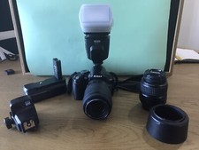 Nikon D3000 18-55; 55-200, + Accessori: Flash; Battery Grip, Trigger, Borsa.