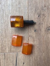 una freccia intera e due coperchi integri honda africa twin 750, dominator