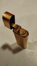 accendino cartier oro