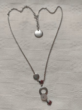 Bijou : collier , coccinelle , porte bonheur , nacre.