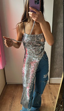 Top con drappeggio asimmetrico