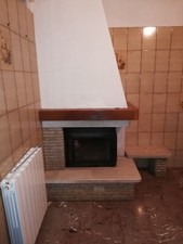 Camino rivestimento angolare in pietra e marmo