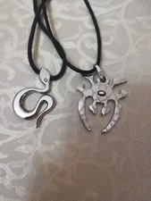 LOTTO 2 CIONDOLI UOMO IN ACCIAIO SERPENTE MORELLATO CON BRILLANTE E RAGNO ORO