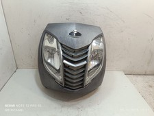 Scudo fari danneggiato - scudo,